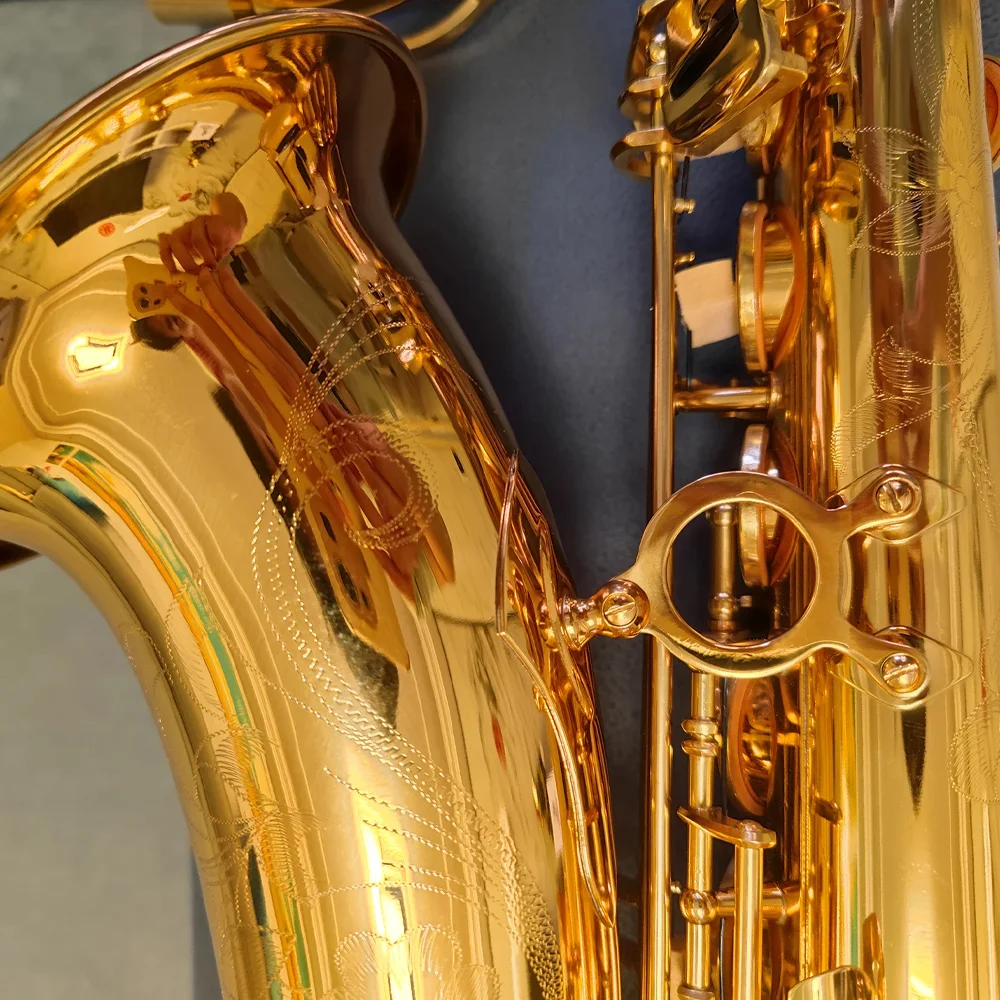 

New professional tenor saxophone with advanced deep carved pattern, professional grade tone, jazz instrument with bag