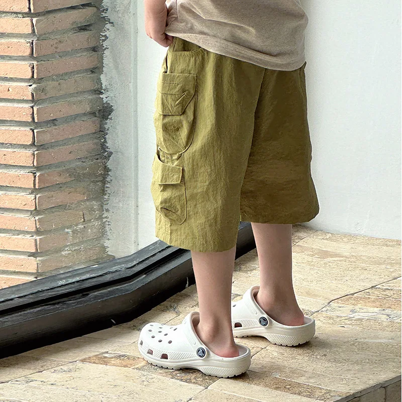 شورت صيفي جديد وسيم لعام 2025 بنمط العمل شورت بنمط أخضر طازج