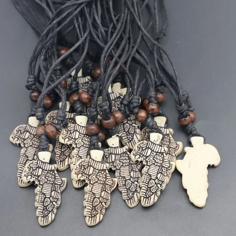 

Hot Sale 10pc set Ox Bone Resin Africa Map Pendant Cotton String Men's Necklace