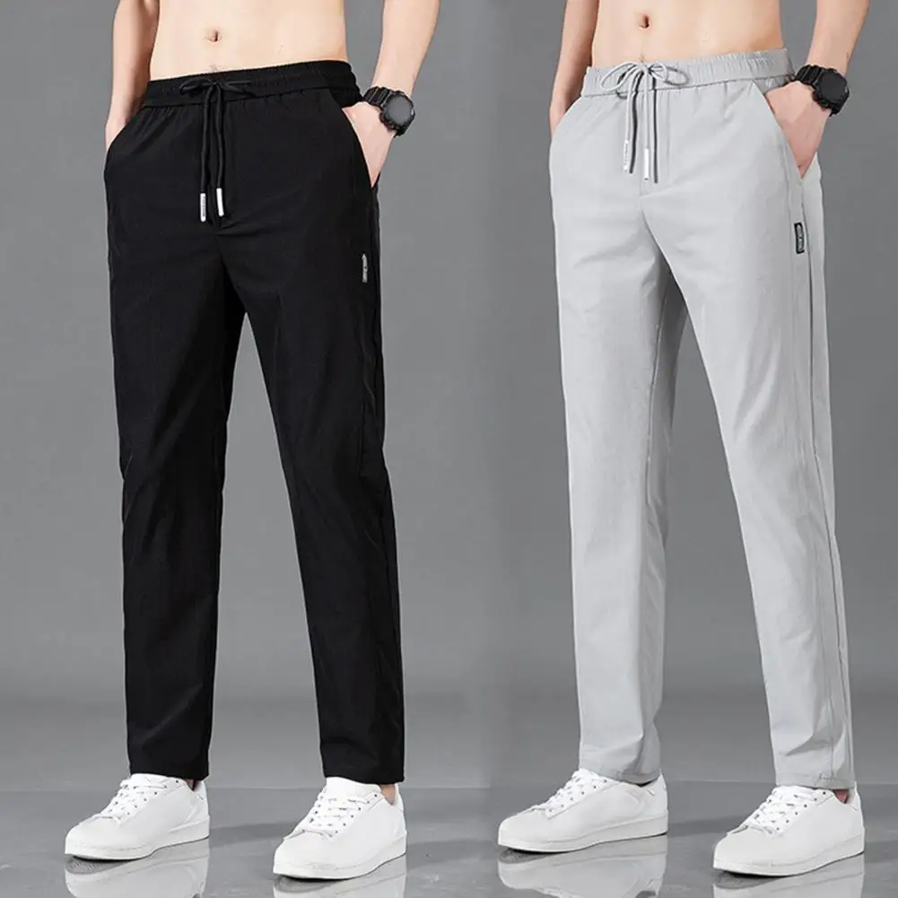 Drawstring Adjustment Trousers Slim Fit Quick Dry Men's Gym Training Jogging Sweatpants with Elastic Waist Side Pockets Solid