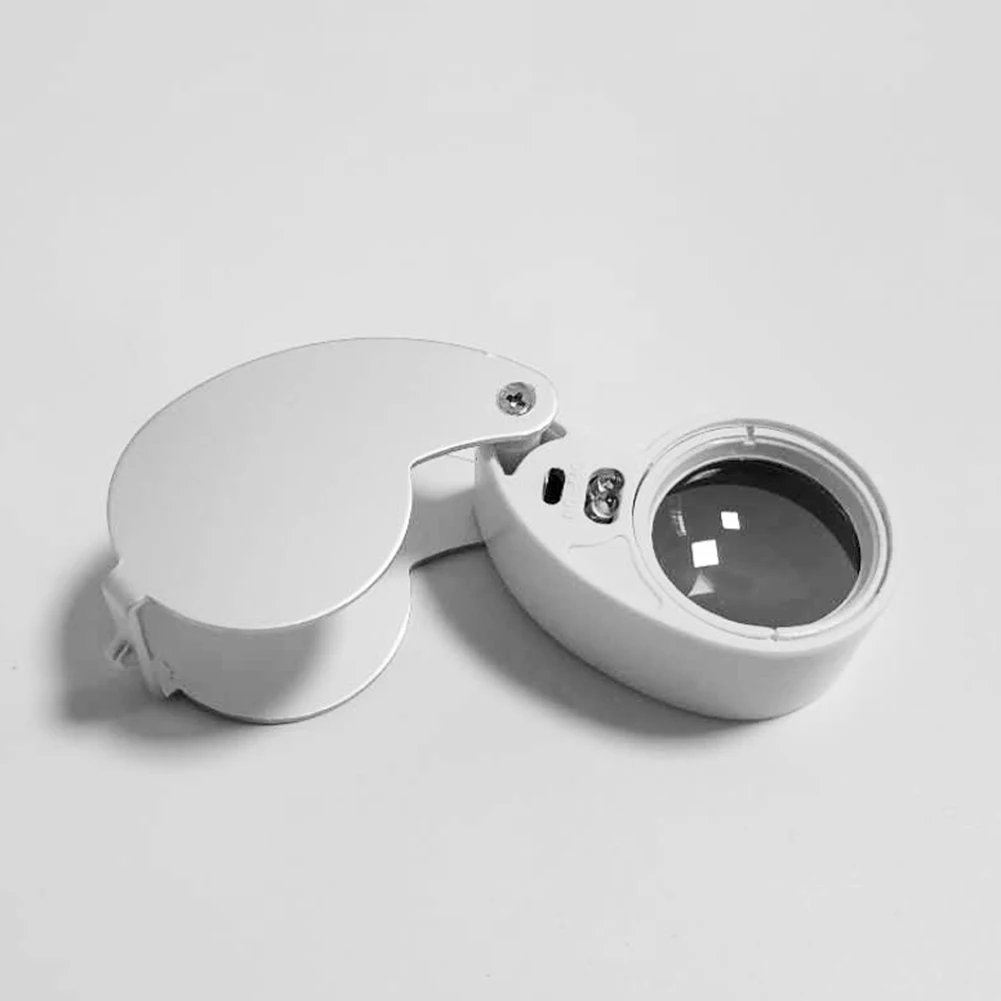 Grossissement Professionnel Loupe Bijoutier 40x DAWRIS - Pliable Avec LED Et UV - Métal - Pour Diamants, Pièces, Timbres Loupe Pliable Métal Grossissement Professionnel Loupe Bijoutier 40x DAWRIS - Pliable Avec LED Et UV - Métal - Pour Diamants, Pièces, Timbres Loupe Pliable Métal