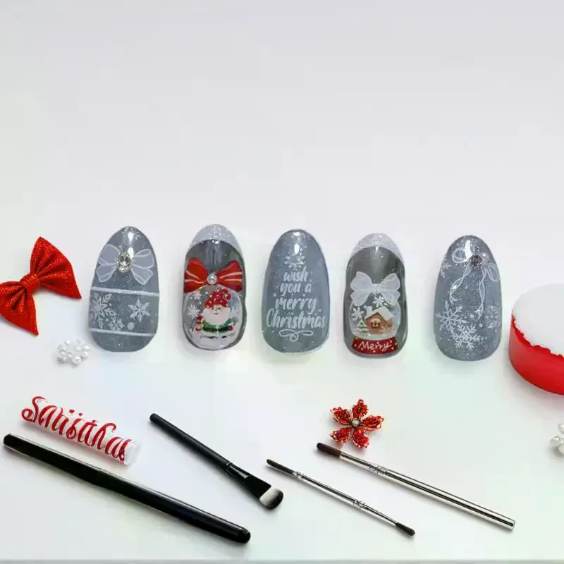 Seasonal Nail Decor with White Snowman and Crystal Snowball Motifs