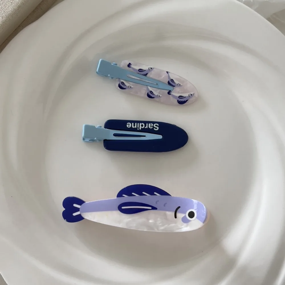 Nouveau mignon dessin animé Sardines pince à cheveux drôle poisson forme acétate matériel frange épingle à cheveux Flyaway pince à cheveux tenue décontracté