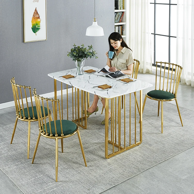 

High-end restaurant marble dining table and chair combination Nordic simple stainless steel gold-plated luxury wrought iron i