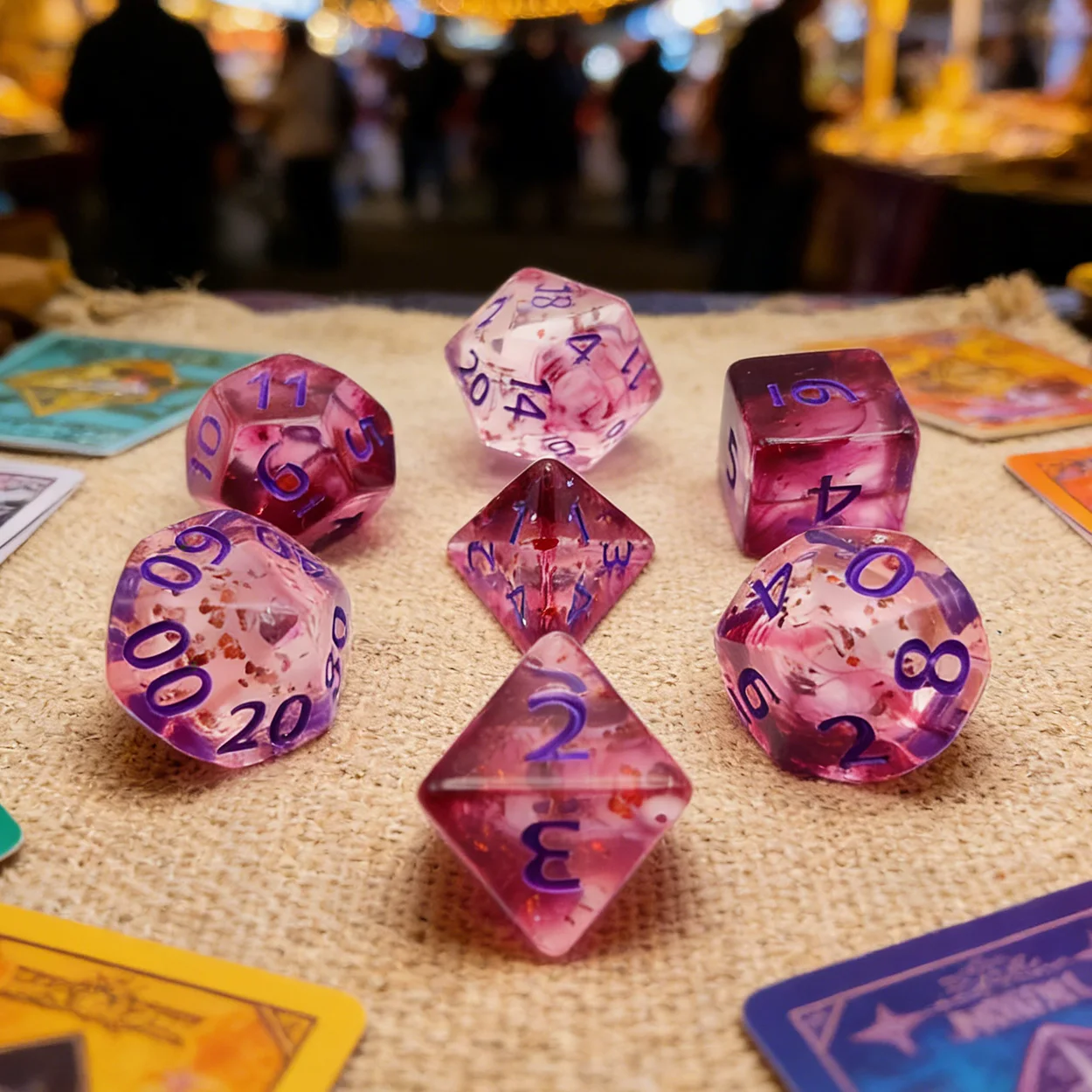 

7-Piece Set of Acrylic Polyhedral Dice with Unique Red-Purple Gradient and Smudged Texture, Embedded with Red Glitter, Transparent Like Amethyst, a Holiday/Birthday Gift for Board Game Enthusiasts