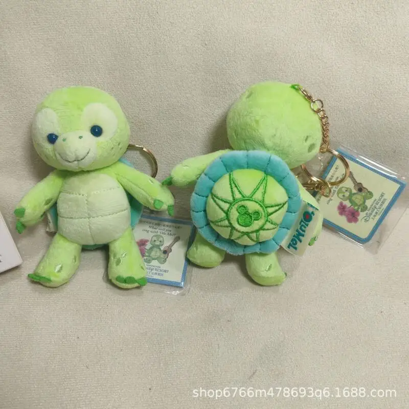 Disney mignon dessin animé tortue Olu Mel pendentif peluche rempli poupée porte-clés sac à dos pendentif Couple cadeau enfants jouet accompagner le sommeil