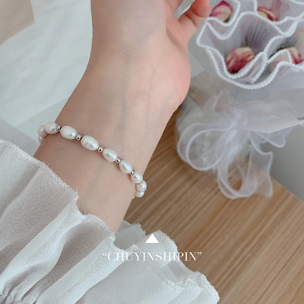 Fashionable S925 Sterling Silver Handcrafted Bracelet with Unique Rice-Shaped Freshwater Pearl Charm