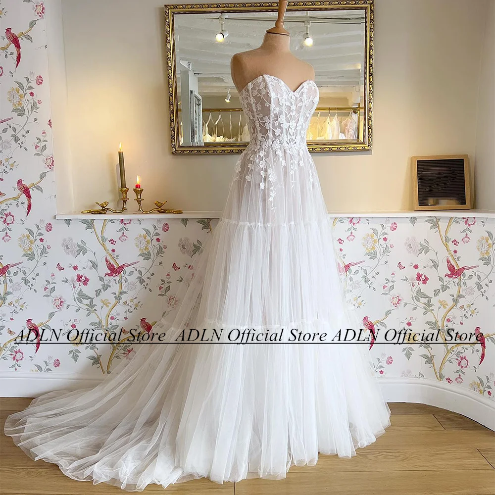 Elegante Schatz ärmellose Brautkleider für Frau Braut sehen durch Applikation eine Linie Sweep Zug Brautkleid Robe Mariee