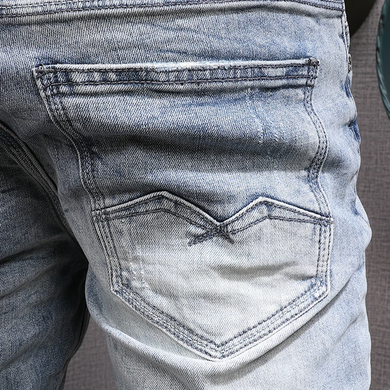 Projektant mody męskie jeansy światło Retro niebieskie elastyczne Slim Fit porwane jeansy męskie spodnie Vintage Stretch casualowe spodnie jeansowe Hombre