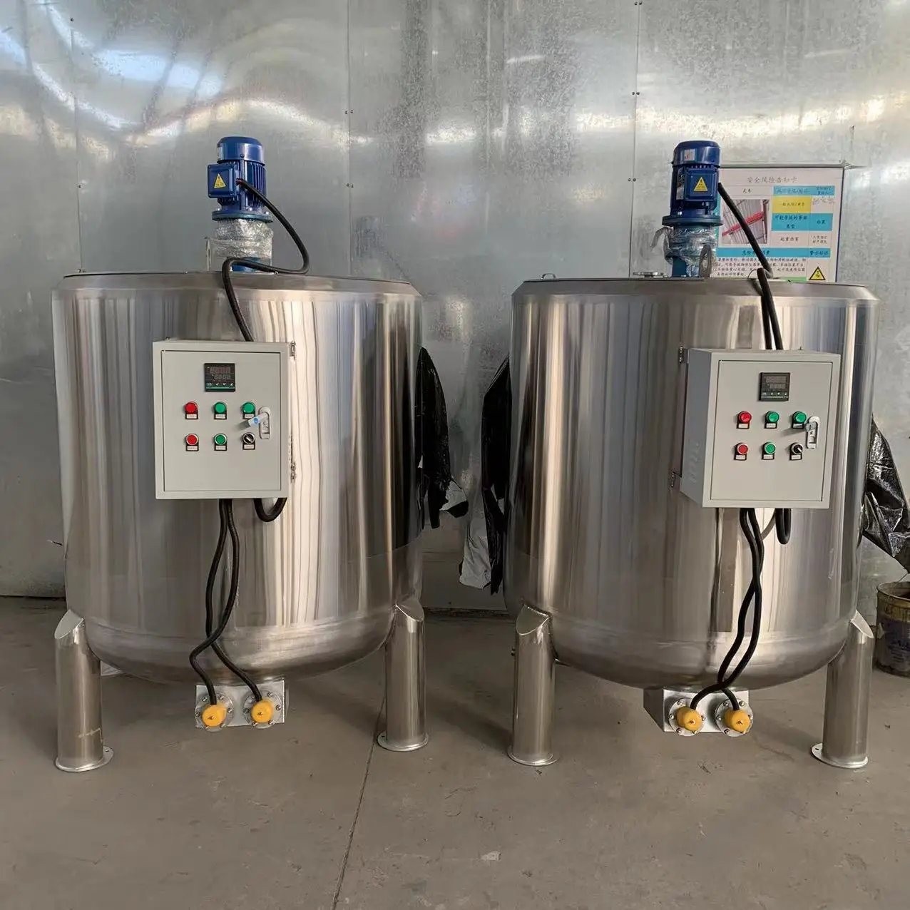 

Stainless steel jacketed tanks with motors and bearings for food processing mixing and storage