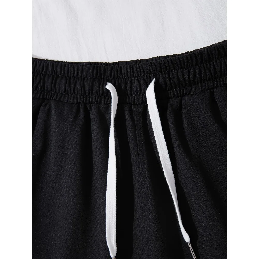 شورت رياضي كاجوال للرجال مع جيوب برباط مطبوعة، شورت رياضي ناعم وفضفاض مناسب لجميع المواسم