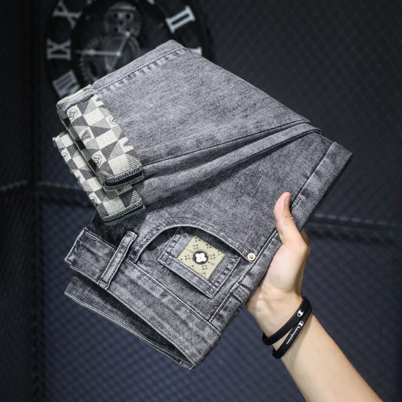 กางเกงยีนส์ผู้ชายปักลายกางเกงบางไฮเอนด์สีฟ้าอ่อนฤดูร้อน2024