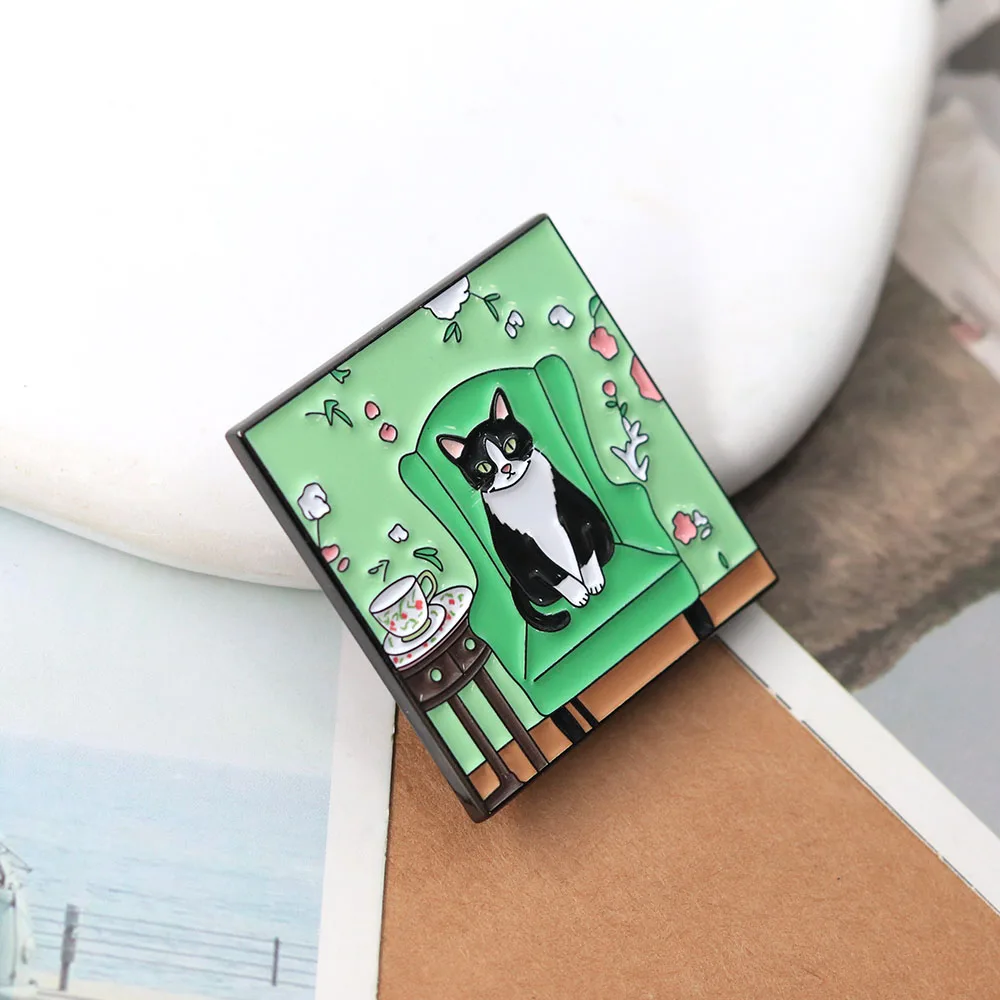 Cute Tuxedo Cat On Green Armchair Enamel Pin Cozy Tea Time Black White Cat Lapel Brooch Suitable For Backpacks And Clothing