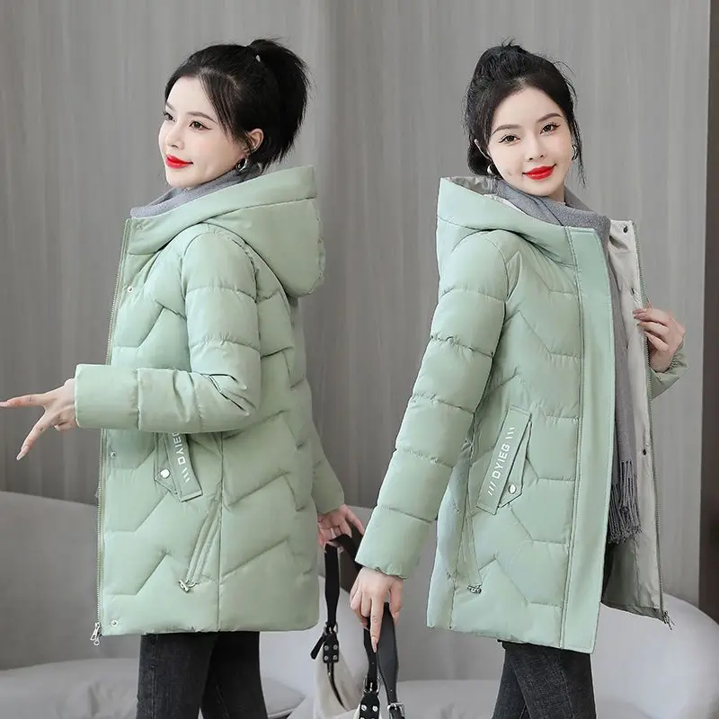 Nova moda inverno feminina de comprimento médio para baixo jaqueta de algodão coreano solto grosso quente acolchoado casaco feminino com capuz