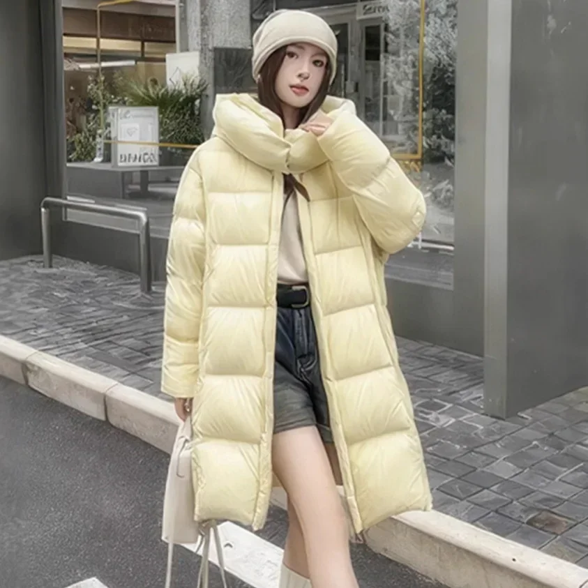 2025 moda de invierno nueva chaqueta de plumón para mujer sudadera con capucha cálida para ir al trabajo a prueba de viento plumón de pato blanco Overcomes