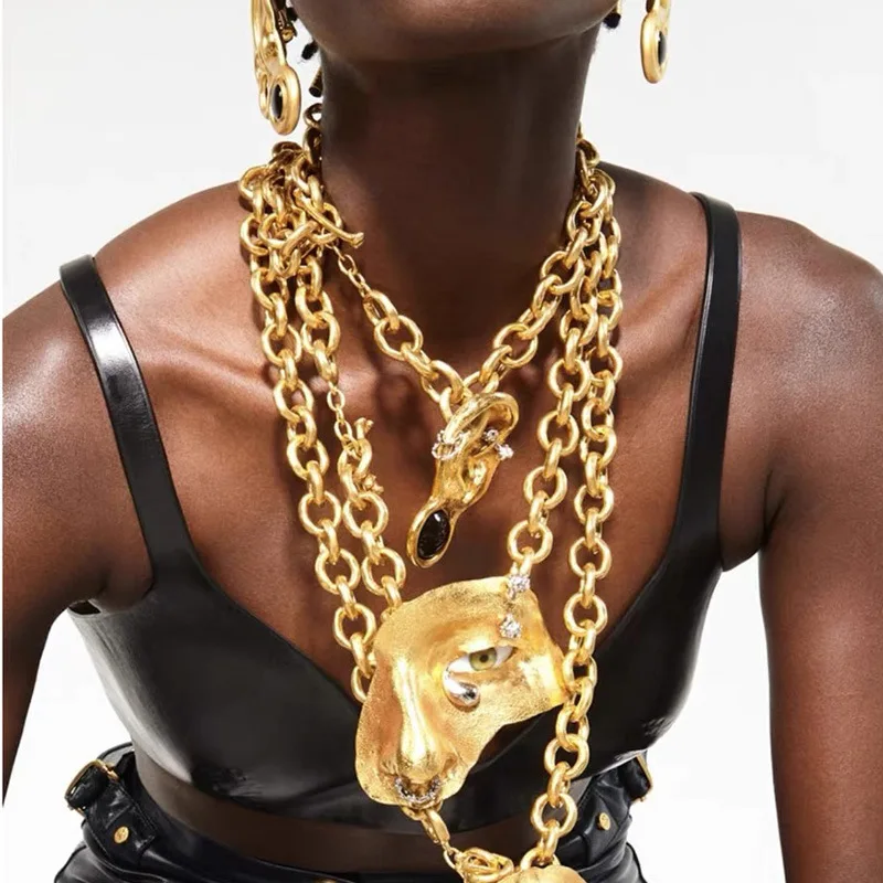 Exaggerated gold color face mask Pendant necklace earrings Cuban chain design feel cool hip hop personality collarbone chain