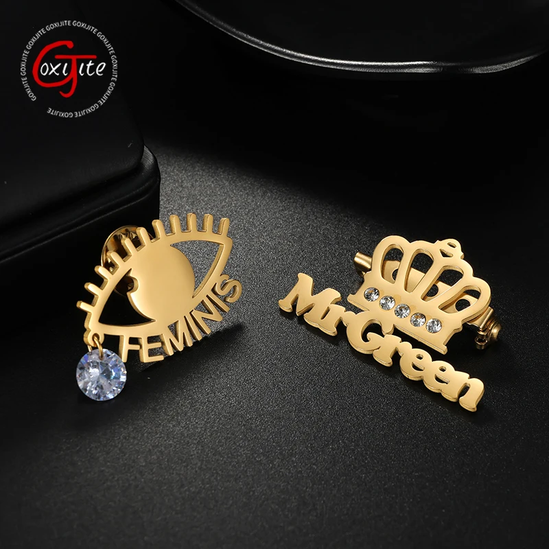 

Goxijite Customized Name Crown With Stone Brooch Stainless Steel Eye Shaped Brooch Hanging Zircon Brooch Banquet Jewelry Gift