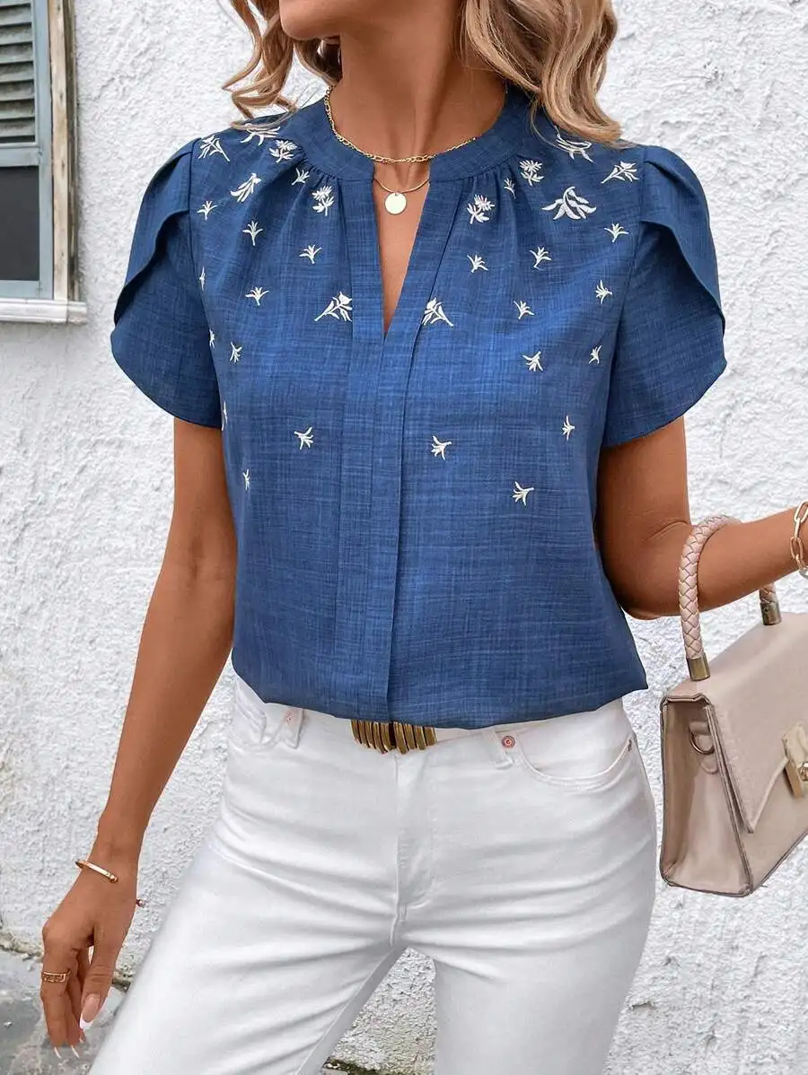

Women's Blue Embroidered Short Sleeve Blouse with Puff Sleeves and V-Neck