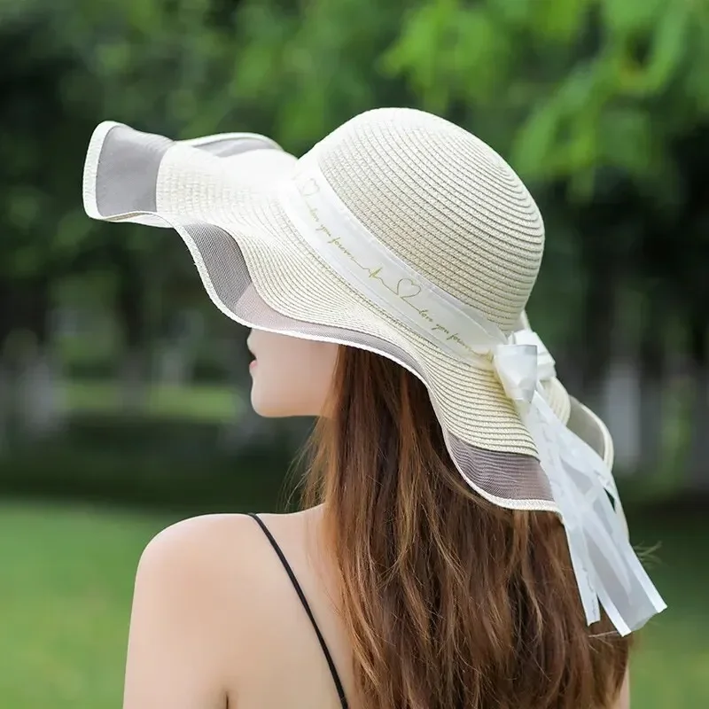 Summer large brimmed beach hat women\'s lace brimmed sun hat Outdoor wavy brimmed sun shade straw cap