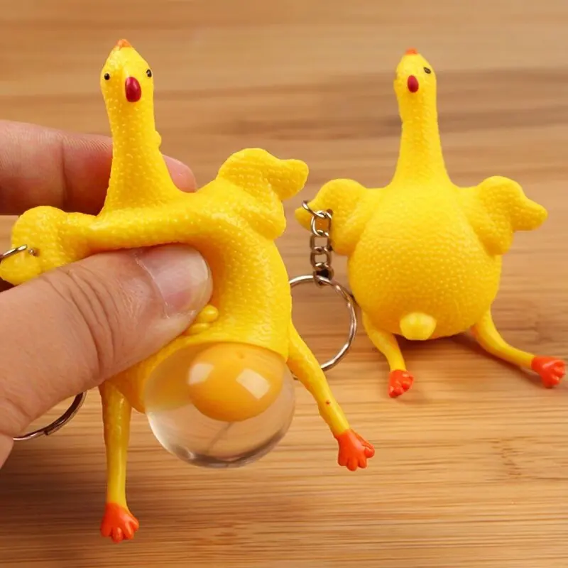 chaveiro-engracado-de-mini-galinha-apertavel-em-tpu-brinquedo-criativo-de-pato-que-poe-ovos-chaveiro-de-novidade-presente-de-brincadeira-humoristica-amarelo