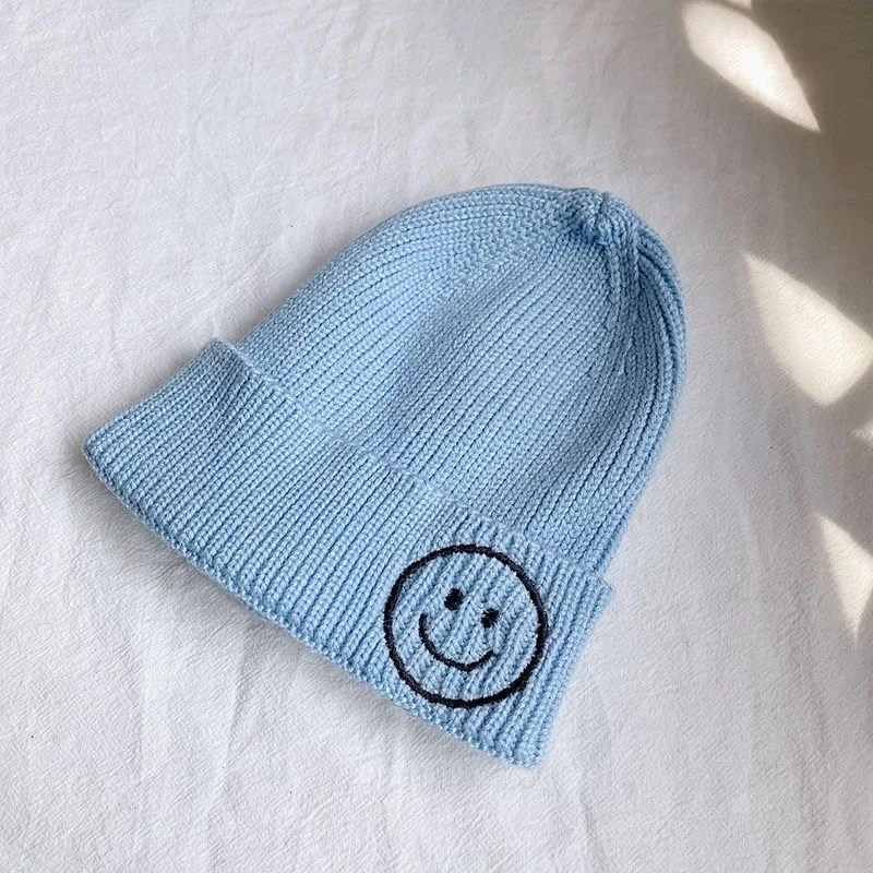 Children\'s smiley face hat Baby hat Fall Winter children boys and girls cute warm knit hat woolen hat trend