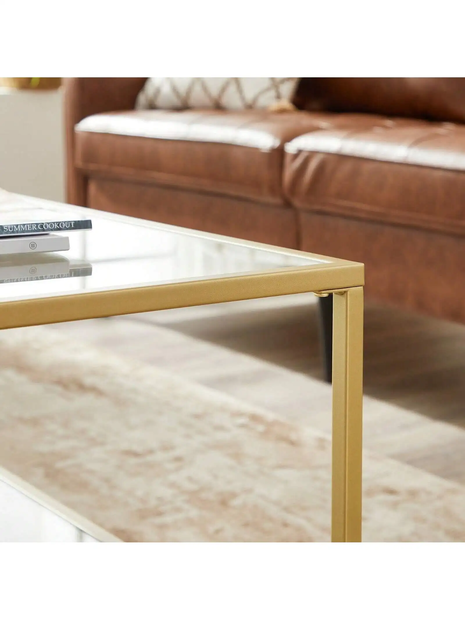 Tavolino da caffè in vetro VASAGLE con contenitore. Superficie in vetro temperato, telaio in acciaio. 100x55x45 cm. Colore dorato.