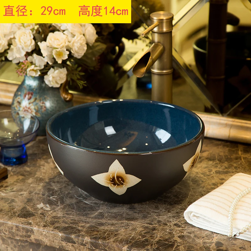 

Washbasin on the table retro ceramic washbasin art basin