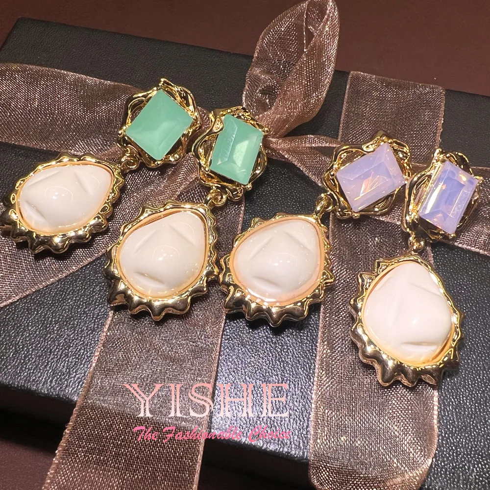 Korean light luxury water drop milky white colored diamond earrings, gentle and elegant design sense commuting versatile high se