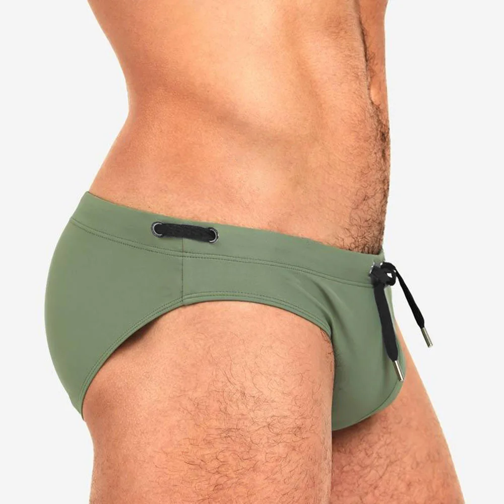 Calzoncillos de baño para hombre, pantalones cortos de playa, Bermudas de baño de cintura baja, tabla de Surf Sexy, traje de baño de Color sólido,