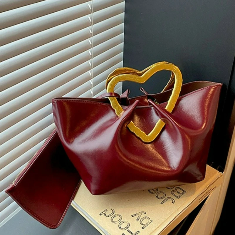 กระเป๋าถือทรงหัวใจสีทองทันสมัย - Women Bags Golden บทวิจารณ์และราคา