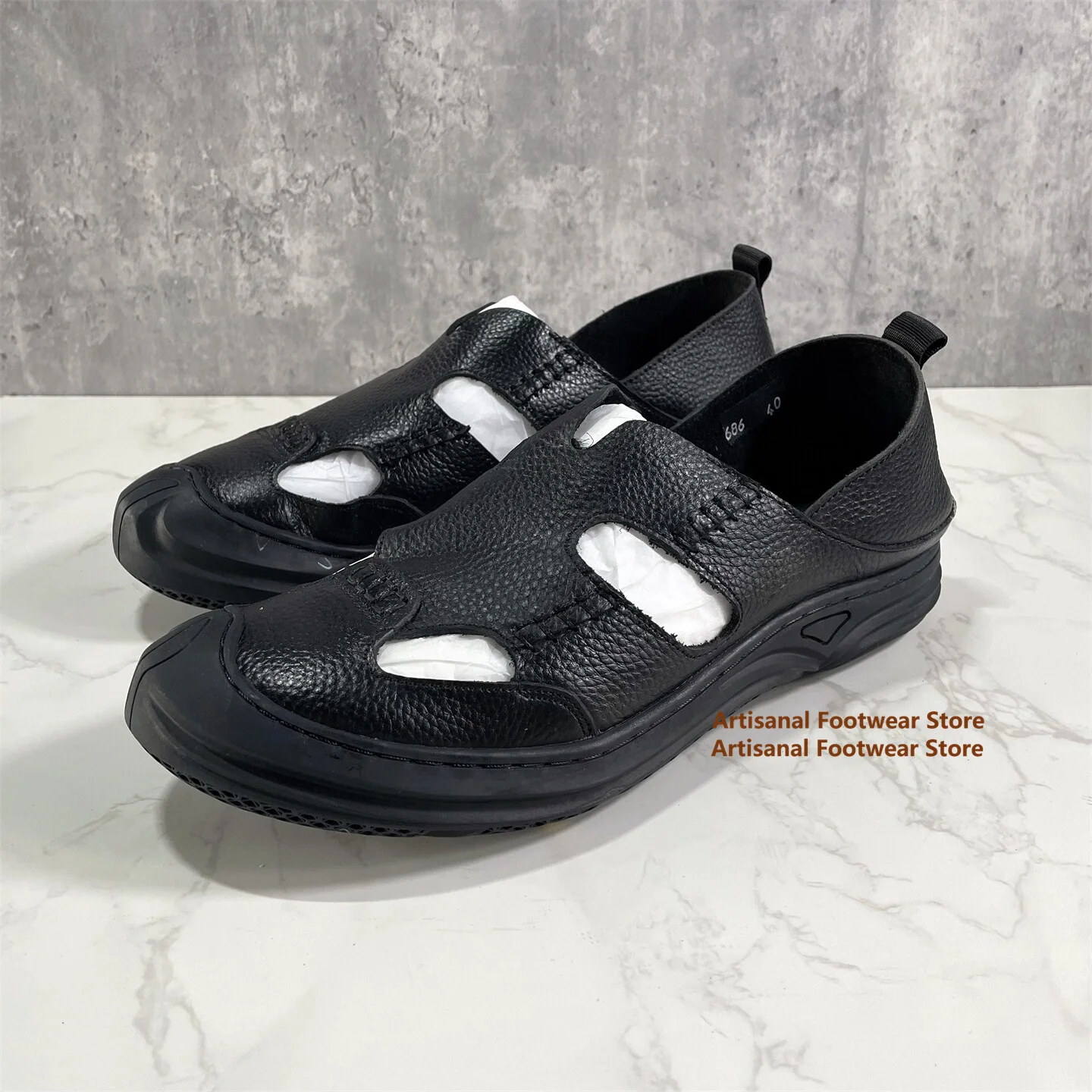 

Men's Black Leather Hollow Cutout Slip-On Loafers Breathable Thick Sole Casual Walking Sandal Shoes Trendy Men's Casual Shoes