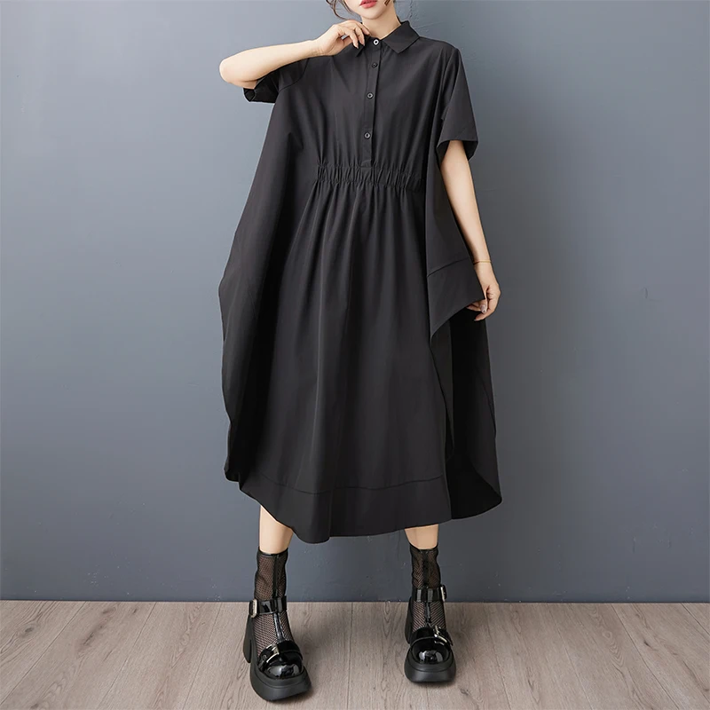 Gonna camicia in stile occidentale dal design di nicchia irregolare scuro, abito ampio che copre la pancia alla moda con spacco laterale