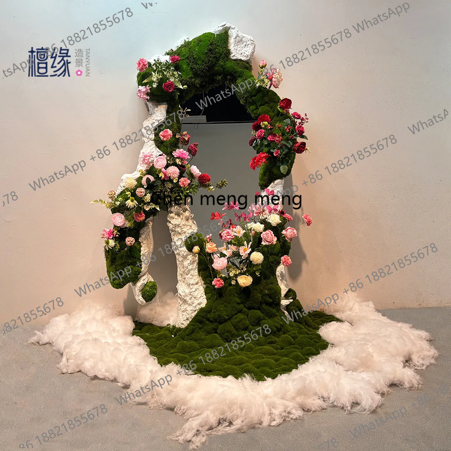 Clothing store window landscaping mirror decorates green plant wall, coffee shop atmosphere arranges floral ornaments