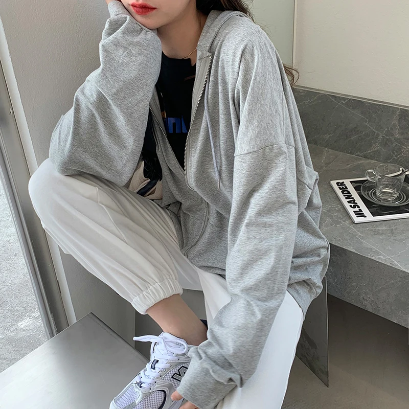 Version ample mince à manches longues manteau de protection à capuche couleur unie chemise rétro sweats à capuche Cardigan à capuche couleur unie