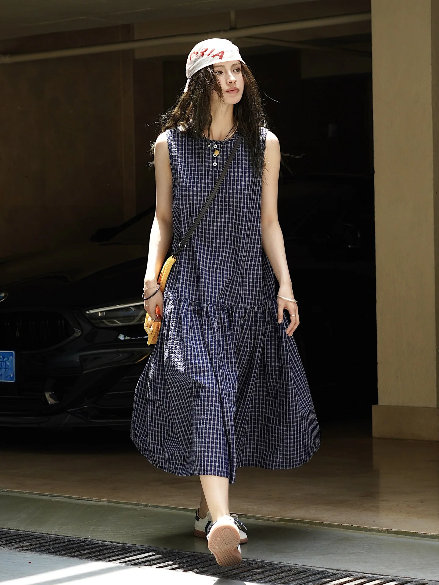 

Woman pretty plaid dress with small buttons and puff skirt