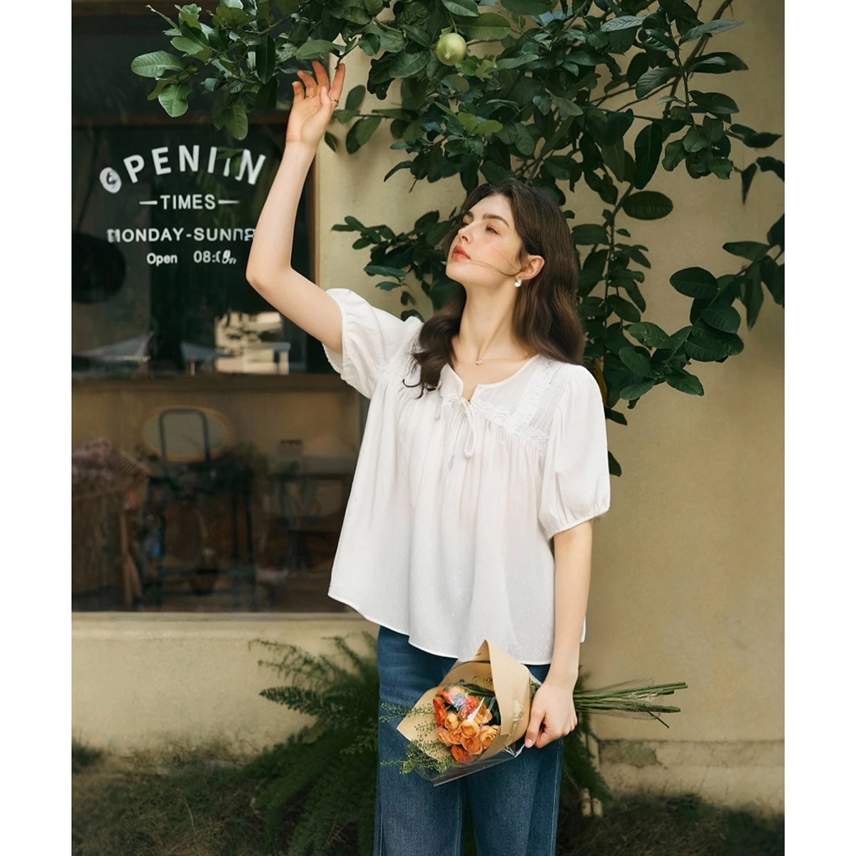 

OLrain Bubble Sleeve Blouses Women White Lace Round Neck Lace-up Shirts Summer 2026 Holiday Style Loose Female Tops O57XX98233