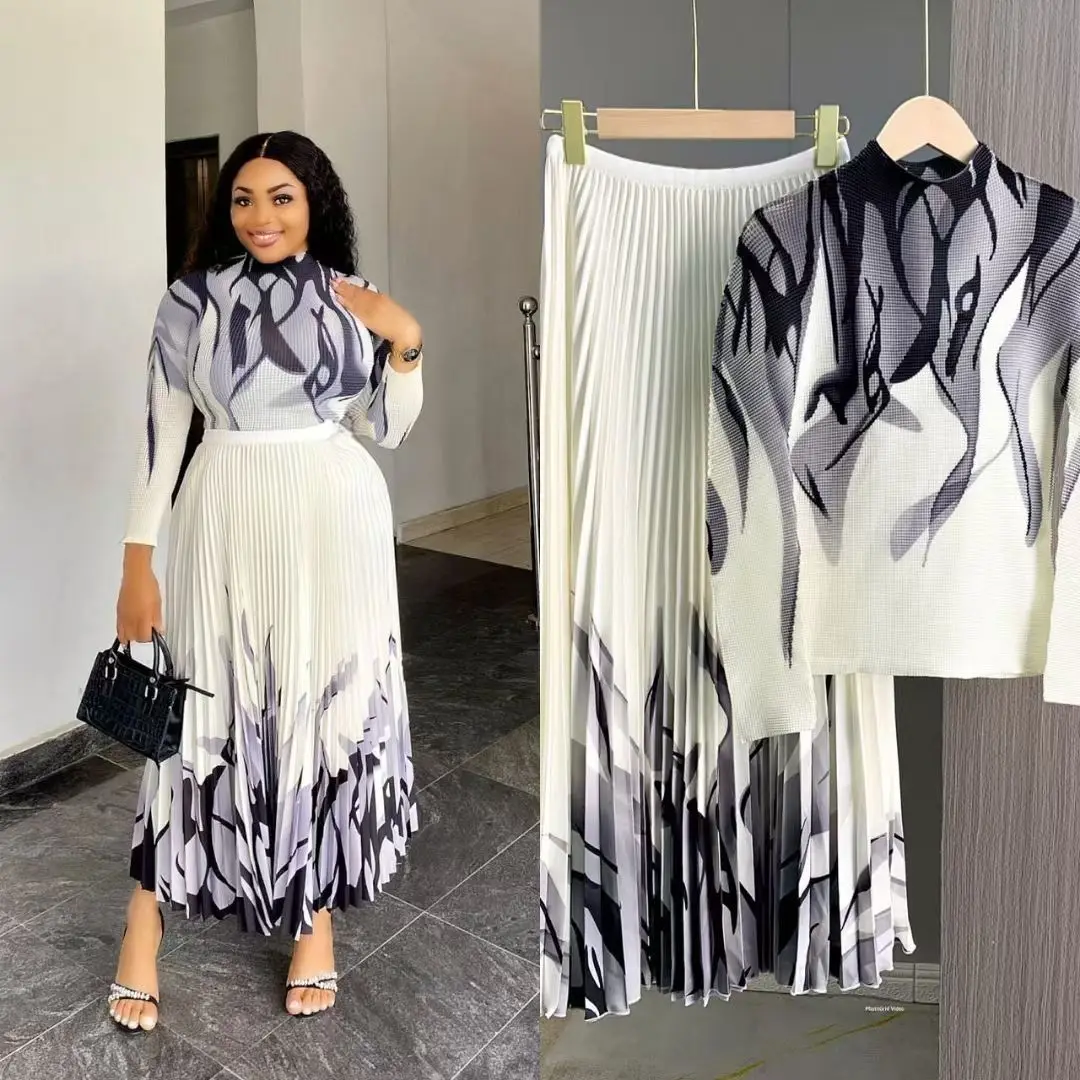 قطعتين المرأة بدلة نواة الذرة مياكي التعادل صبغ تنورة حجم كبير دعوى مطوي عالية المرونة طويلة الأكمام مطوي تنورة رائجة البيع الأوروبية والأمريكية اليومية المنزل السفر