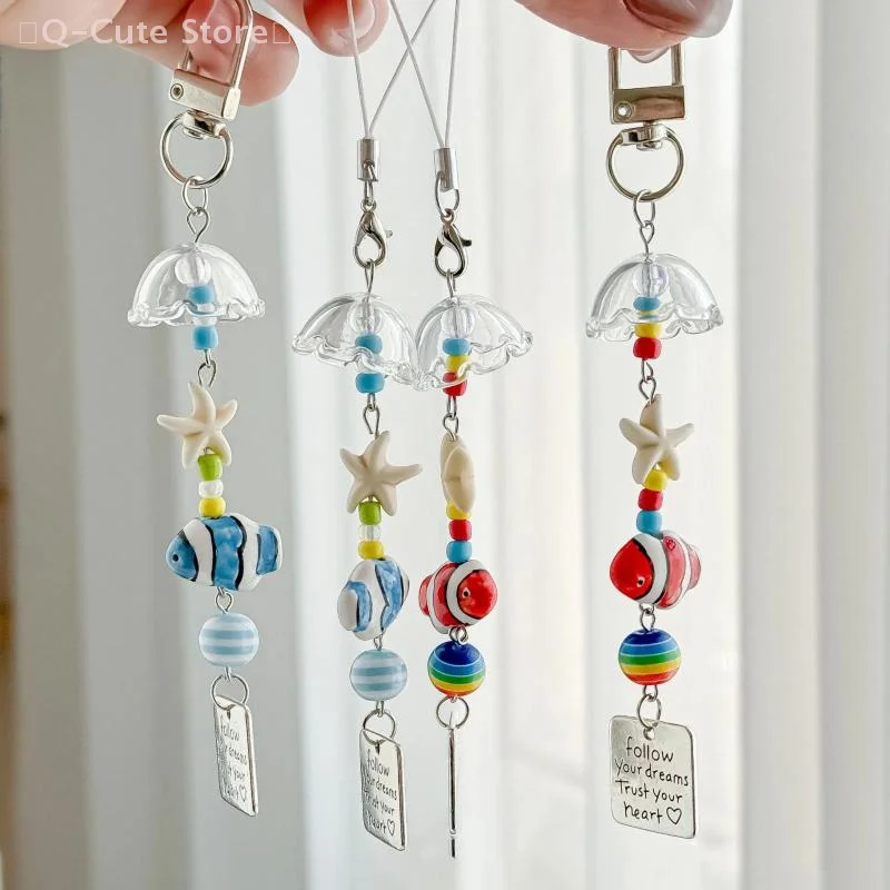 

Cute Wind Chime Keychain with Beaded Lucky Fish and Starfish Cartoon Design, Mobile Phone Lanyard & Bag Pendant.