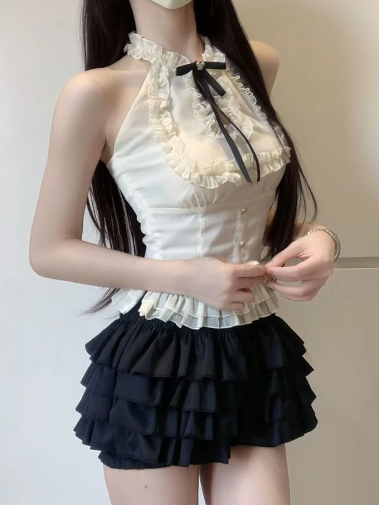 Seksowny, gorący zestaw dwuczęściowy z wycięciami i dekoltem typu slash, elegancki, słodki, nowy komplet damski, modny, ciepły, czarny, krótki spódniczka typu cake.