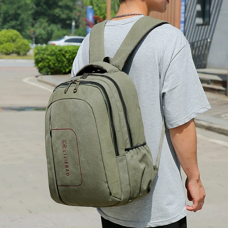 

Canvas wear-resistant, lightweight student schoolbag, large-capacity multi-pocket travel waterproof hand-held backpack