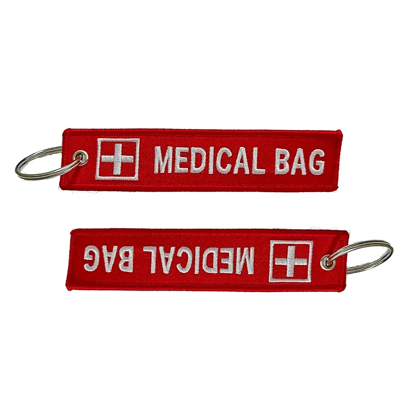 100Pcs Emergency First Aid Bag Embroidered Keychain Luggage Tag