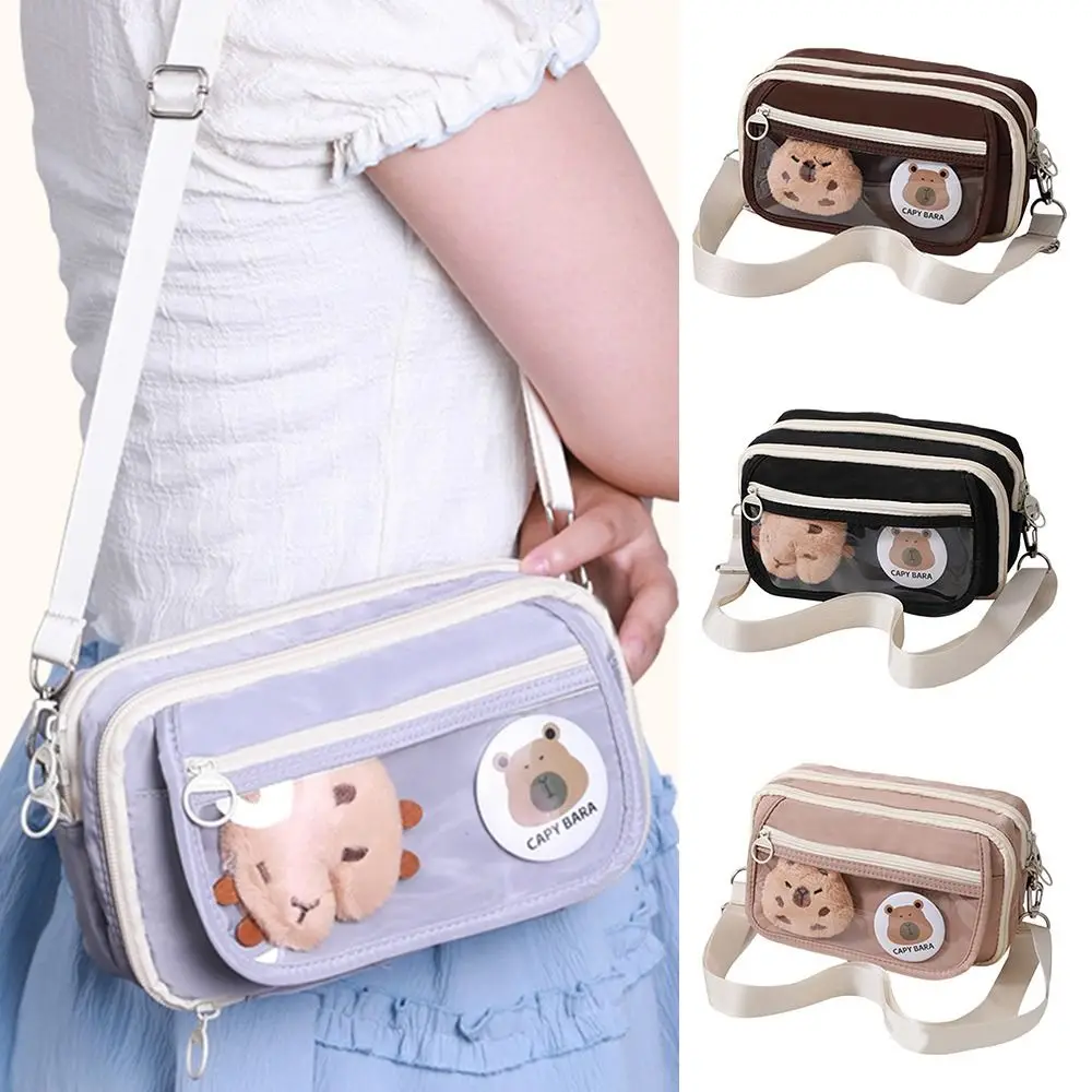 

Cartoon Capybara Pen Bag 9 Layer Large Capacity Stationery Bag With Brooches Stickers Clips Crossbody Pencil Case Gift