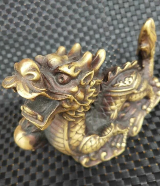 

Chinese Old Brass Hand-Carved Zodiac Dragon Craft Statue