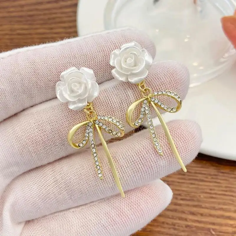 925 Silver Needle Korean Fashion Camellia Flower Earrings For Women Jewelry 2026 Trending New Women\'s Crystal Bow Drop Earrings