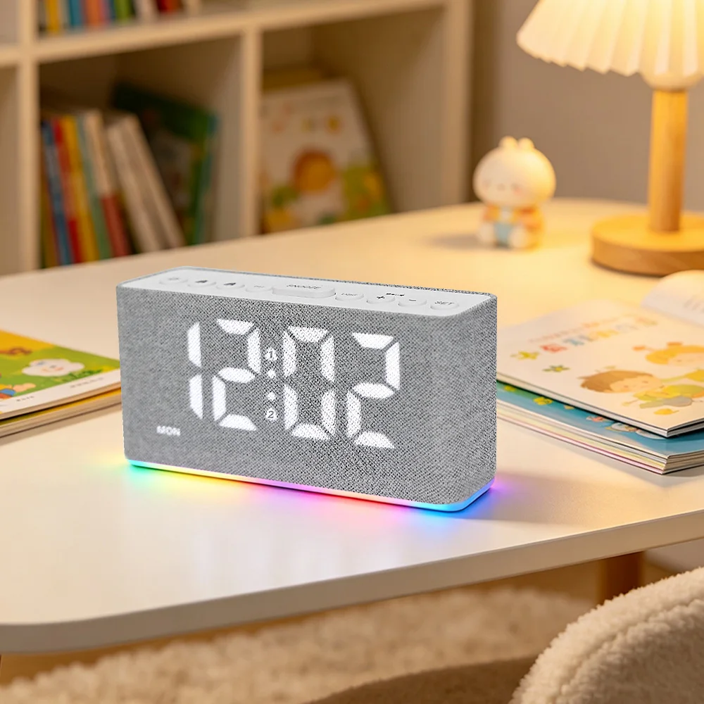 This multi-functional RGB digital alarm clock features two alarms, a snooze function, time display, daylight saving time functio