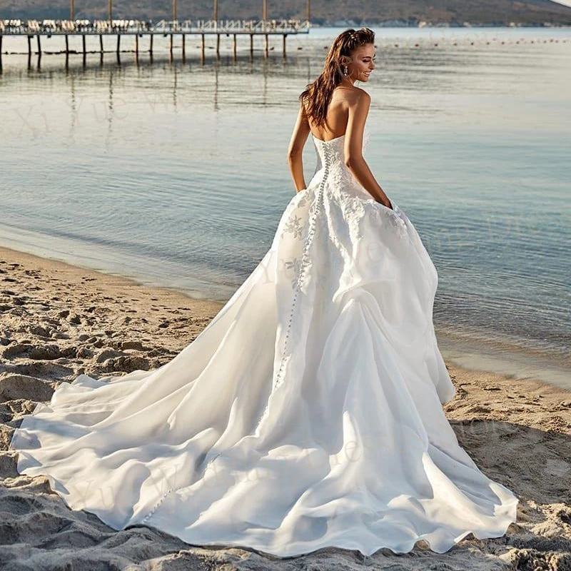 Schöne Prinzessin eine Linie Brautkleider mit Tasche Schatz moderne rücken freie Brautkleider Spitze Applikationen vestidos de novias