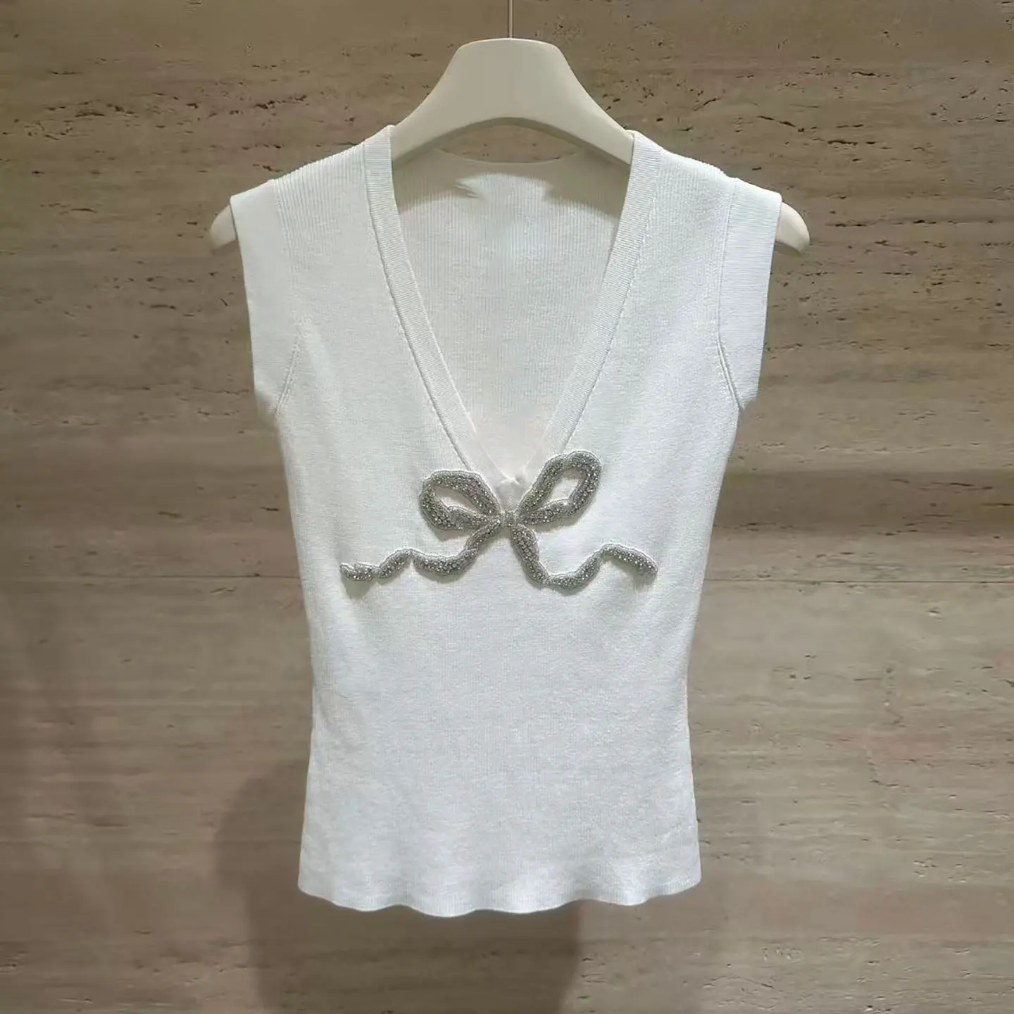 

Women's V-neck bow knitted top