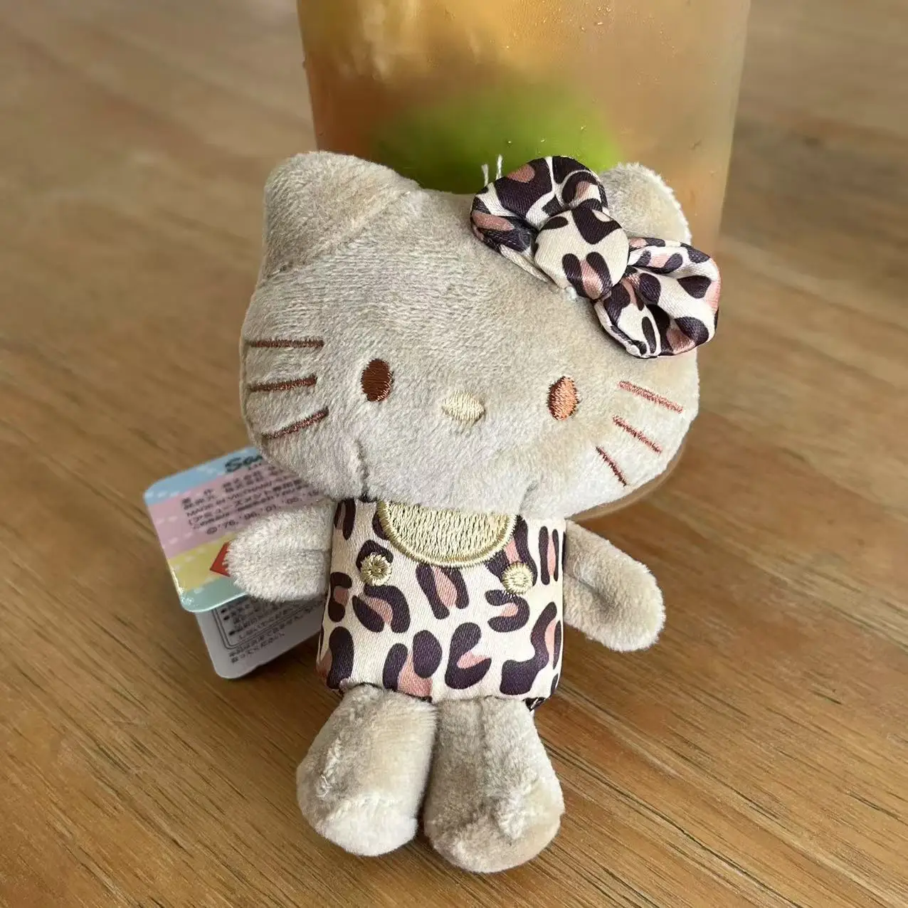 Sanrio Hello Kitty falda con estampado de leopardo Sanrio muñeco de peluche niñas bolso adornos Anime llavero de felpa chica novia regalos de cumpleaños