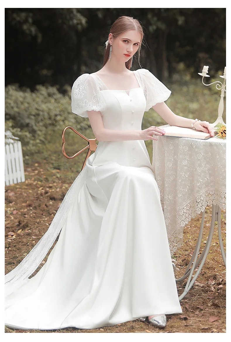 Bellissimi abiti da sposa affascinanti che dimagriscono semplici abiti da sposa Sexy aperti sul retro in pizzo elegante abito da sera