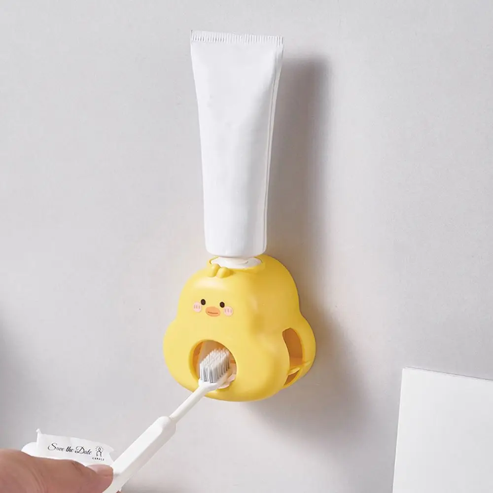 

Plastic Yellow Duck Toothpaste Dispenser No Punching Wall Mount Toothpaste Squeezer Cartoon Toothbrush Holder for Bathroom